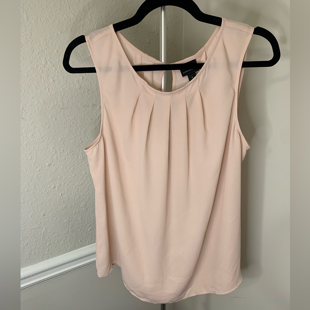 Sleeveless light pink blouse